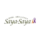 Logo "NPO法人 女性ネットさやさや Saya-Saya" avec des rubans de sensibilisation orange et violet, dans un cercle blanc.