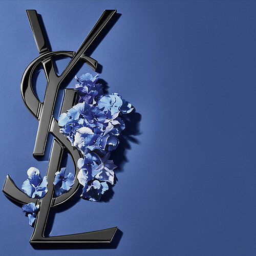Logo YSL noir et fleurs bleues sur fond bleu
