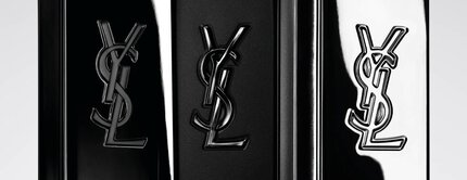 Trois flacons de parfum YSL noirs sur fond clair