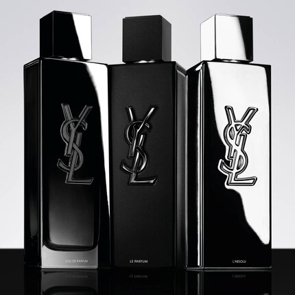 Trois flacons de parfum YSL noirs sur fond clair