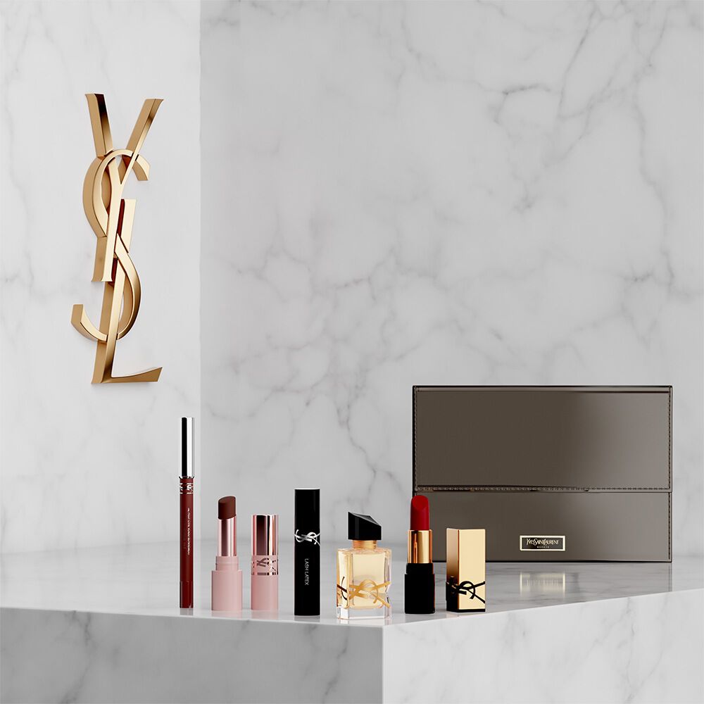Coffret beaute YSL avec mini-produits et trousse.