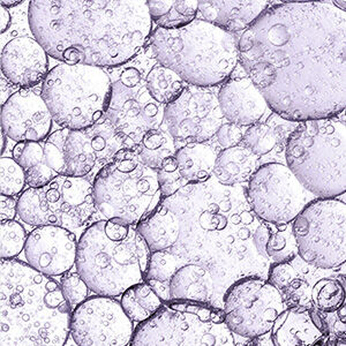 Bulles transparentes sur un fond violet clair.