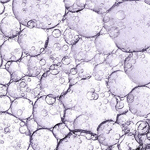 Bulles transparentes sur un fond violet clair.
