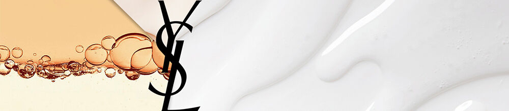 A close-up of a textured white surface next to a golden fluid with bubbles, with the "YSL" logo prominently displayed.