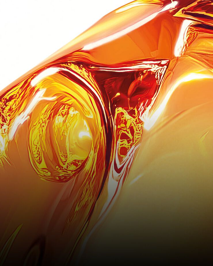 Texture liquide dorée brillante représentant l’ectoïne