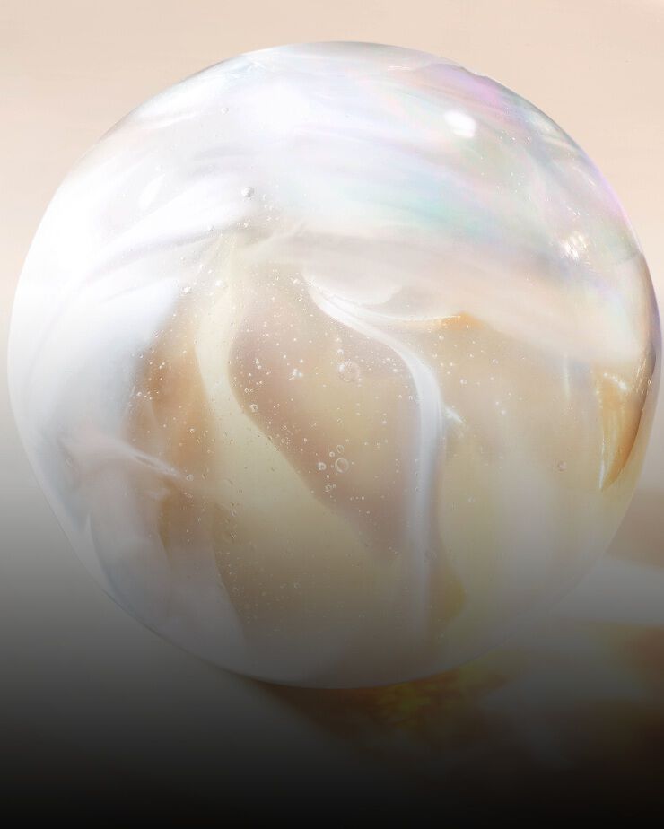 Sphère translucide nacrée représentant le complexe Alpha-Panthenol